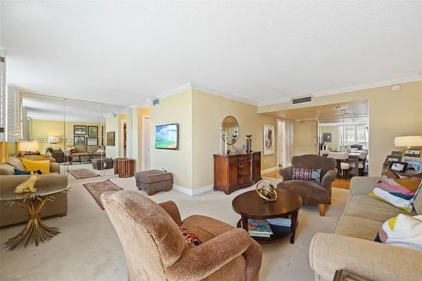 a living room with furniture and a couch