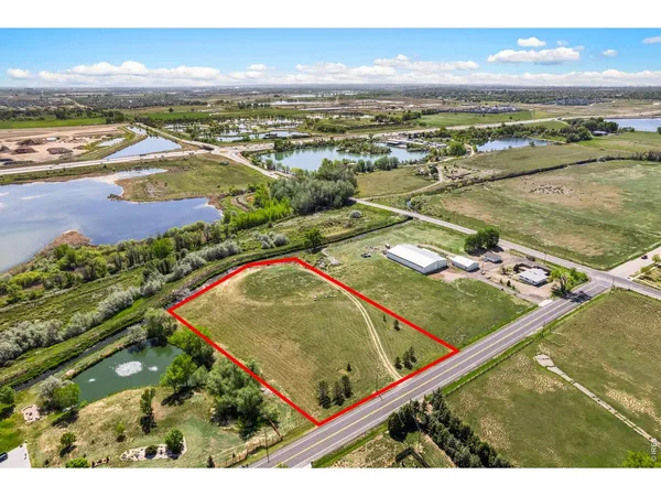 a view of a big yard with a house