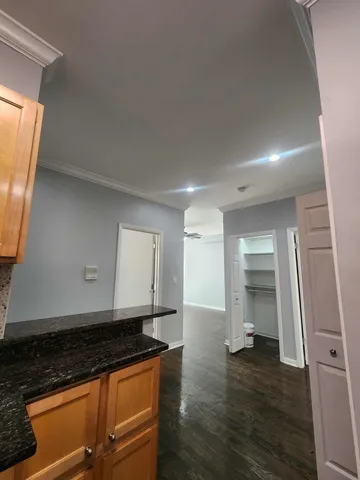 a view of a kitchen with a sink and a stove