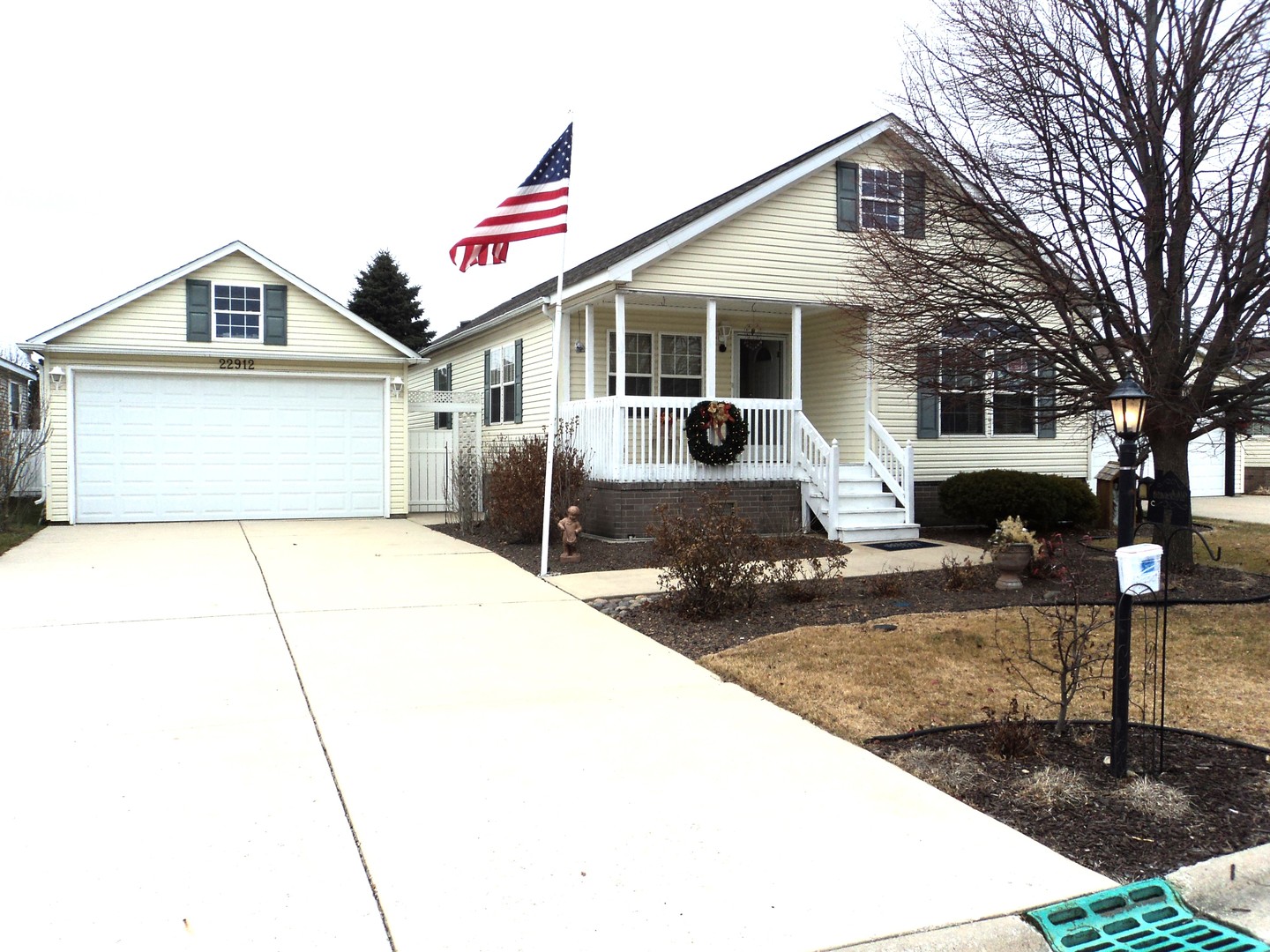 22912 Pinehurst Drive Frankfort, IL 60423 - Photo 2 of 21 a front view of a house with porch