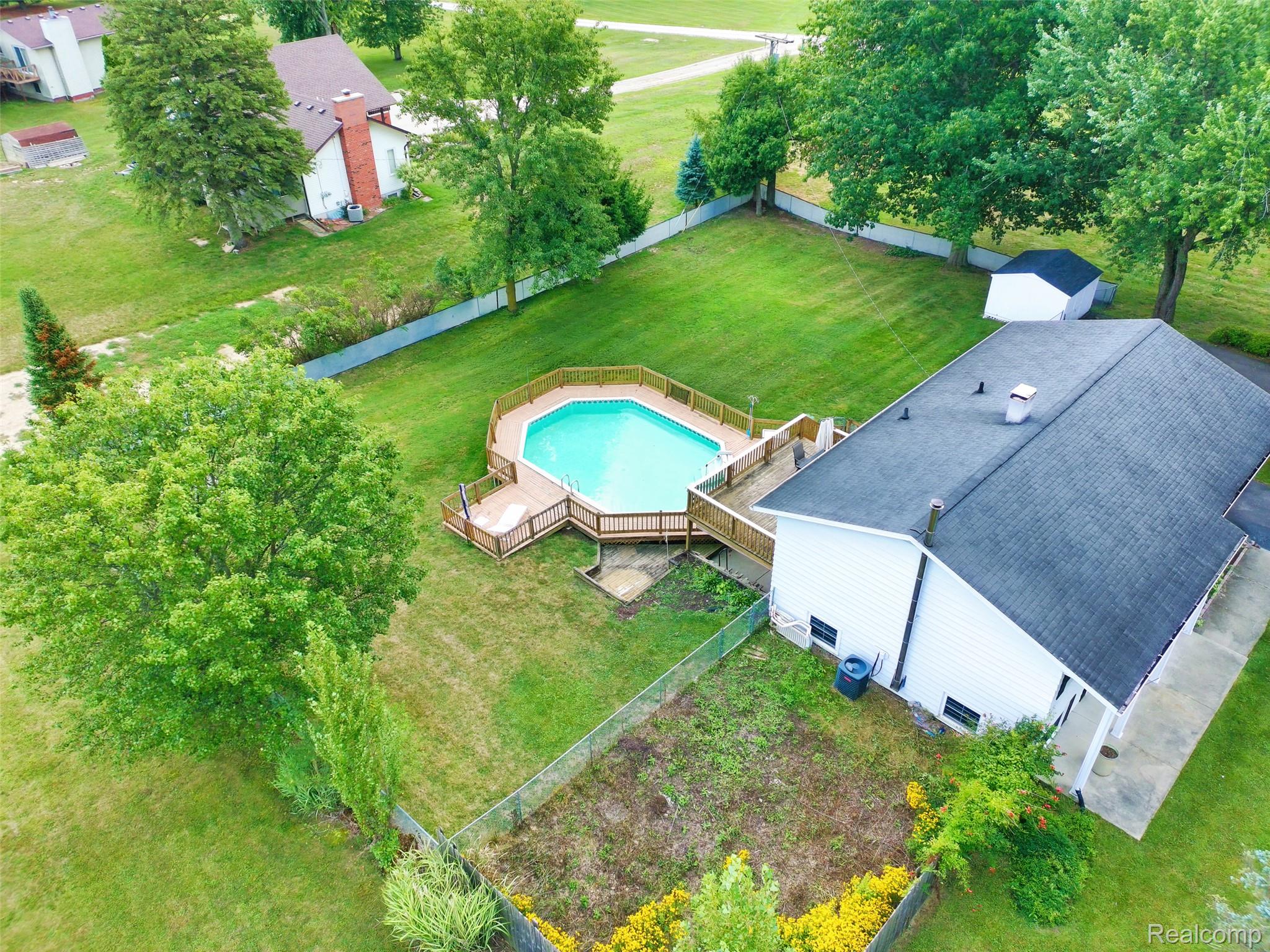 9805 Platt Road Milan, MI 48160 - Photo 38 of 49 44_side of home drone.jpg