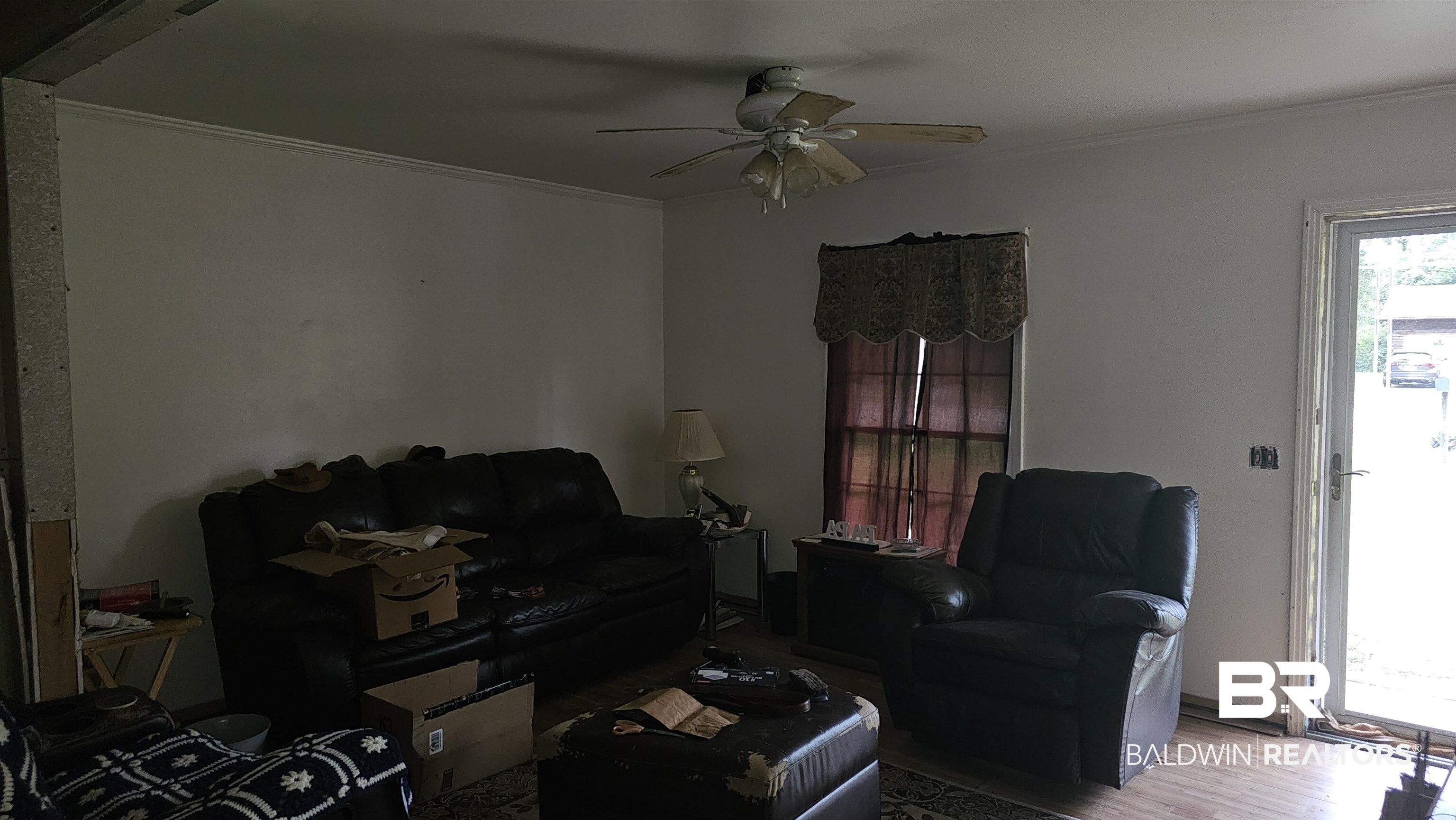 216 6th Avenue Atmore, AL 36502 - Photo 19 of 34 Living room featuring light hardwood / wood-style flooring, ceiling fan, and ornamental molding