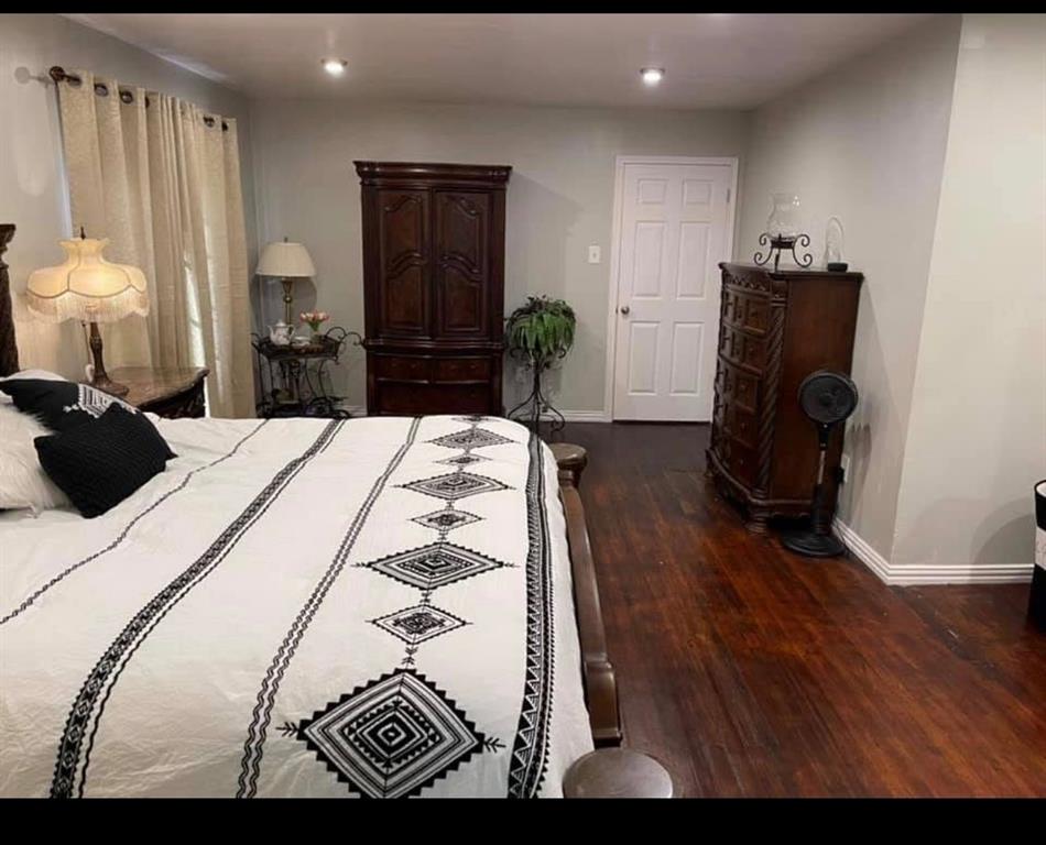 2924 Windsor Avenue Waco, TX 76708 - Photo 14 of 25 Recessed lighting, wood-finish flooring, paneled interior doors, and neutral wall tones