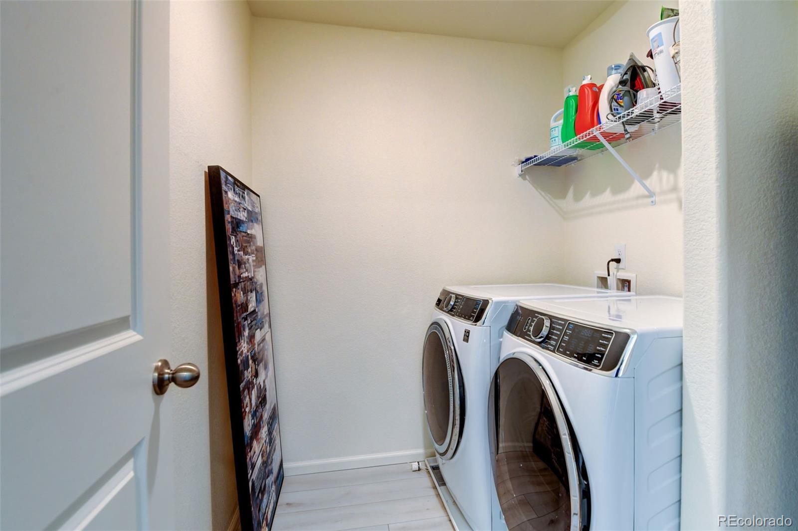 7252 Fall River Circle Frederick, CO 80530 - Photo 23 of 31 a utility room with dryer and washer