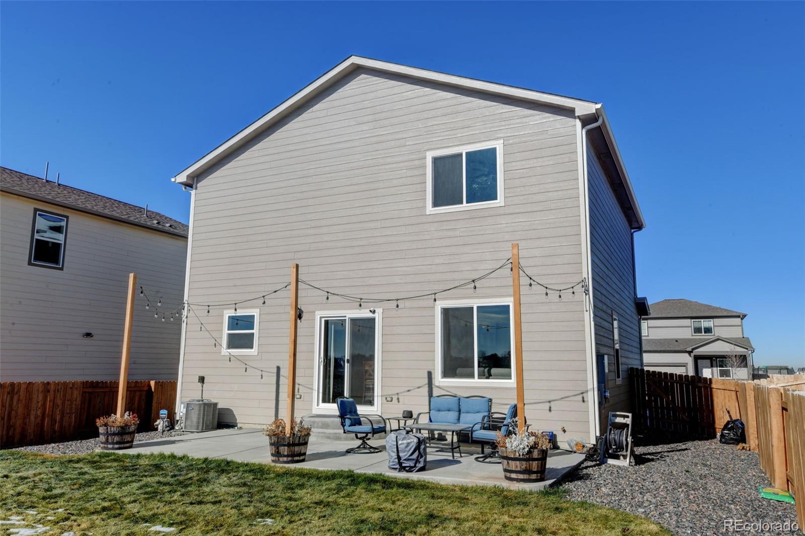 7252 Fall River Circle Frederick, CO 80530 - Photo 24 of 31 a view of a house with backyard
