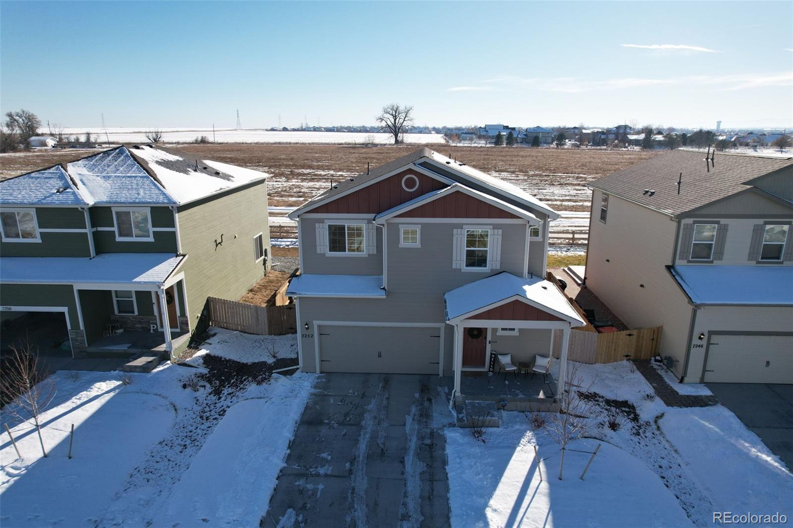 7252 Fall River Circle Frederick, CO 80530 - Photo 28 of 31 an aerial view of a house with swimming pool