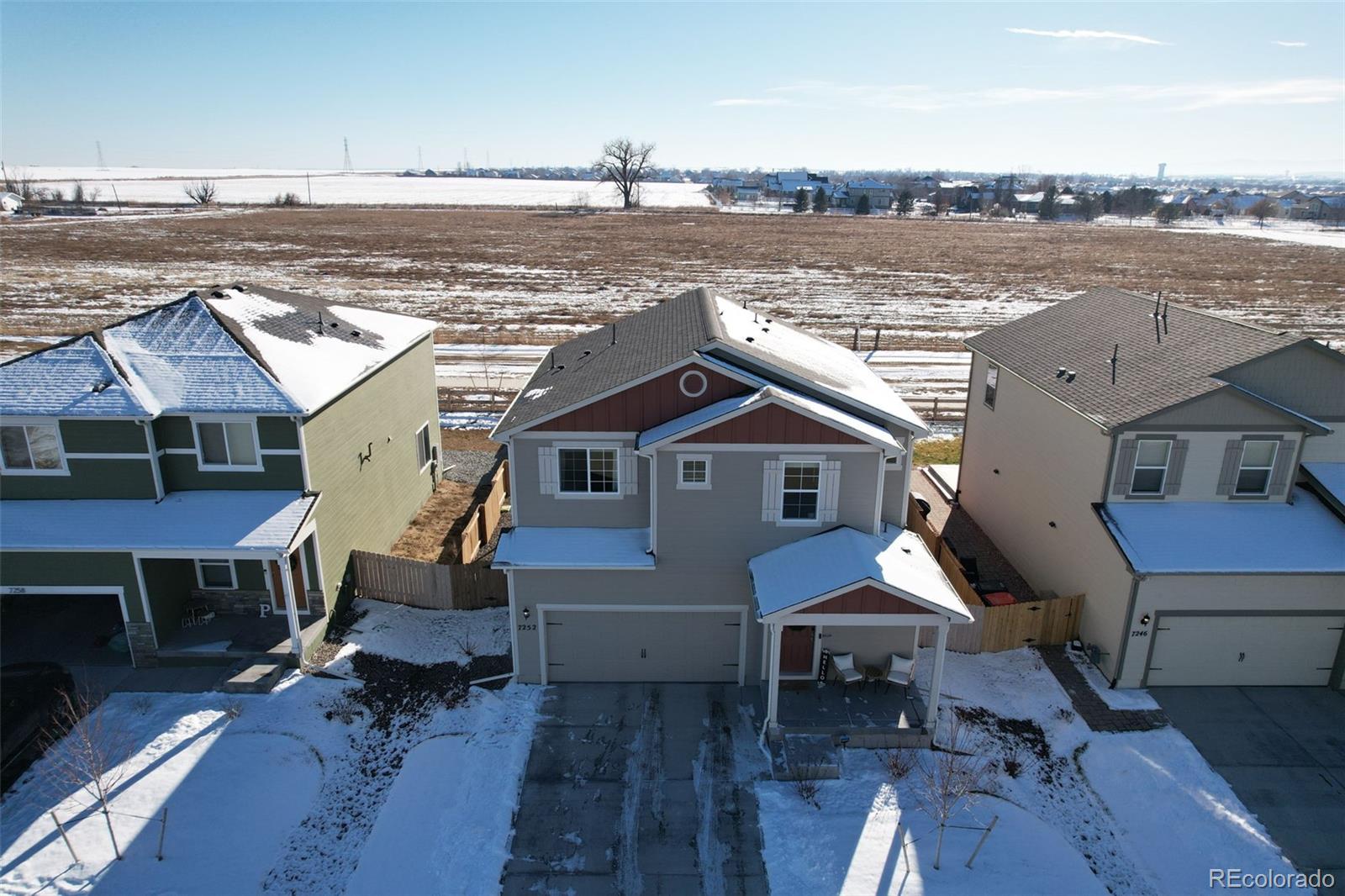7252 Fall River Circle Frederick, CO 80530 - Photo 31 of 31 an aerial view of a house with a yard view and a floor to ceiling window