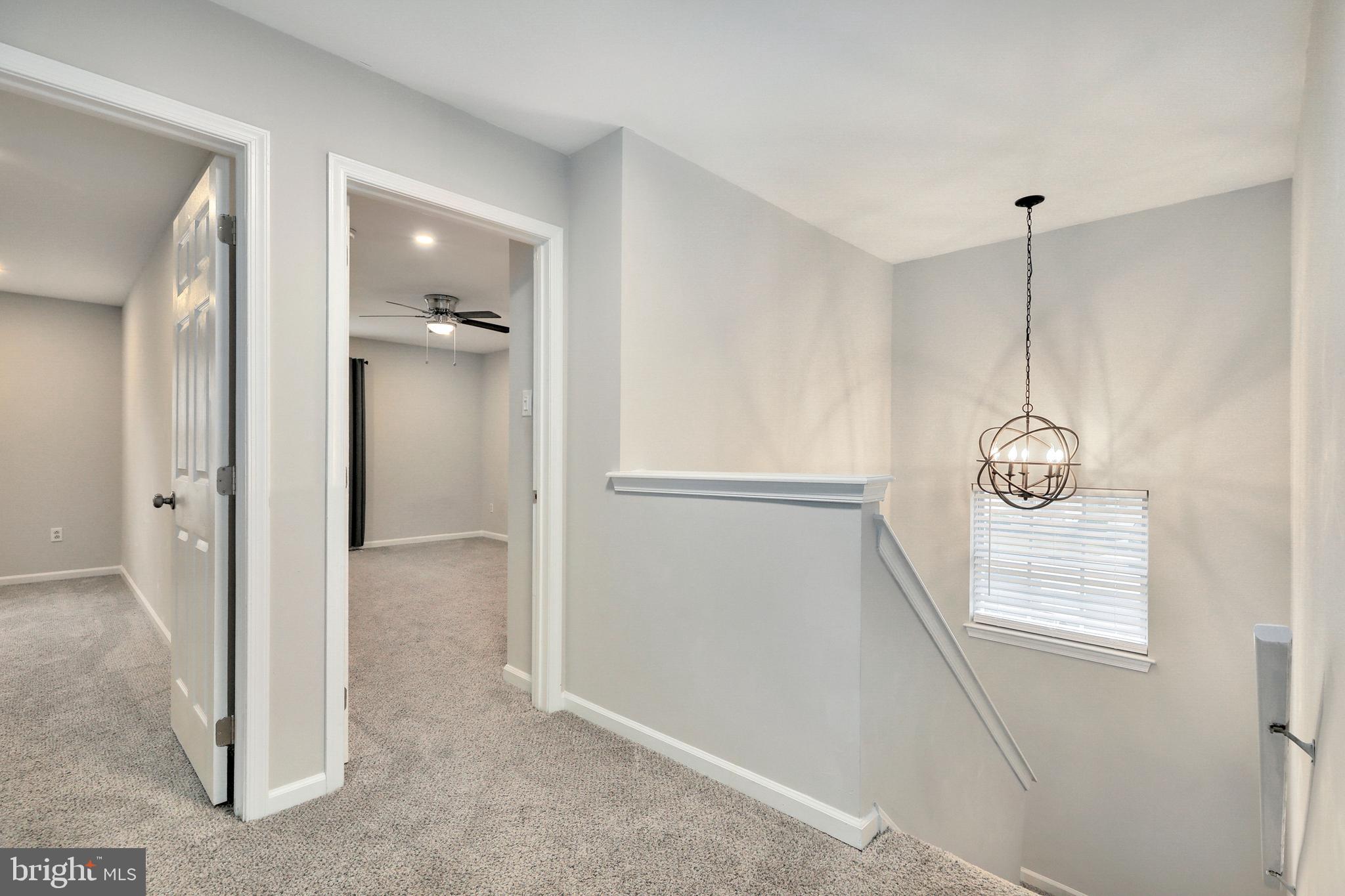 1804 Mason Run Pine Hill, NJ 08021 - Photo 15 of 32 a view of hallway with a washer and dryer