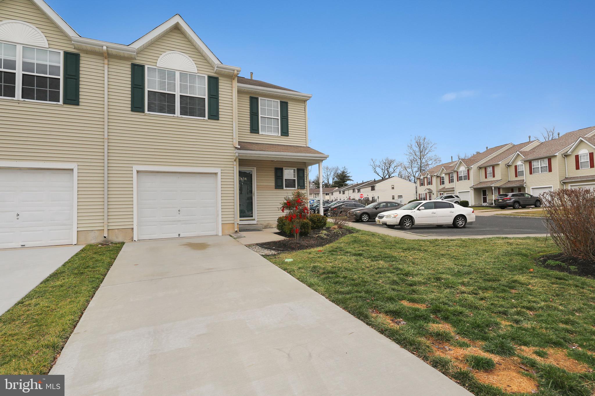 1804 Mason Run Pine Hill, NJ 08021 - Photo 2 of 32 a front view of a house with garden