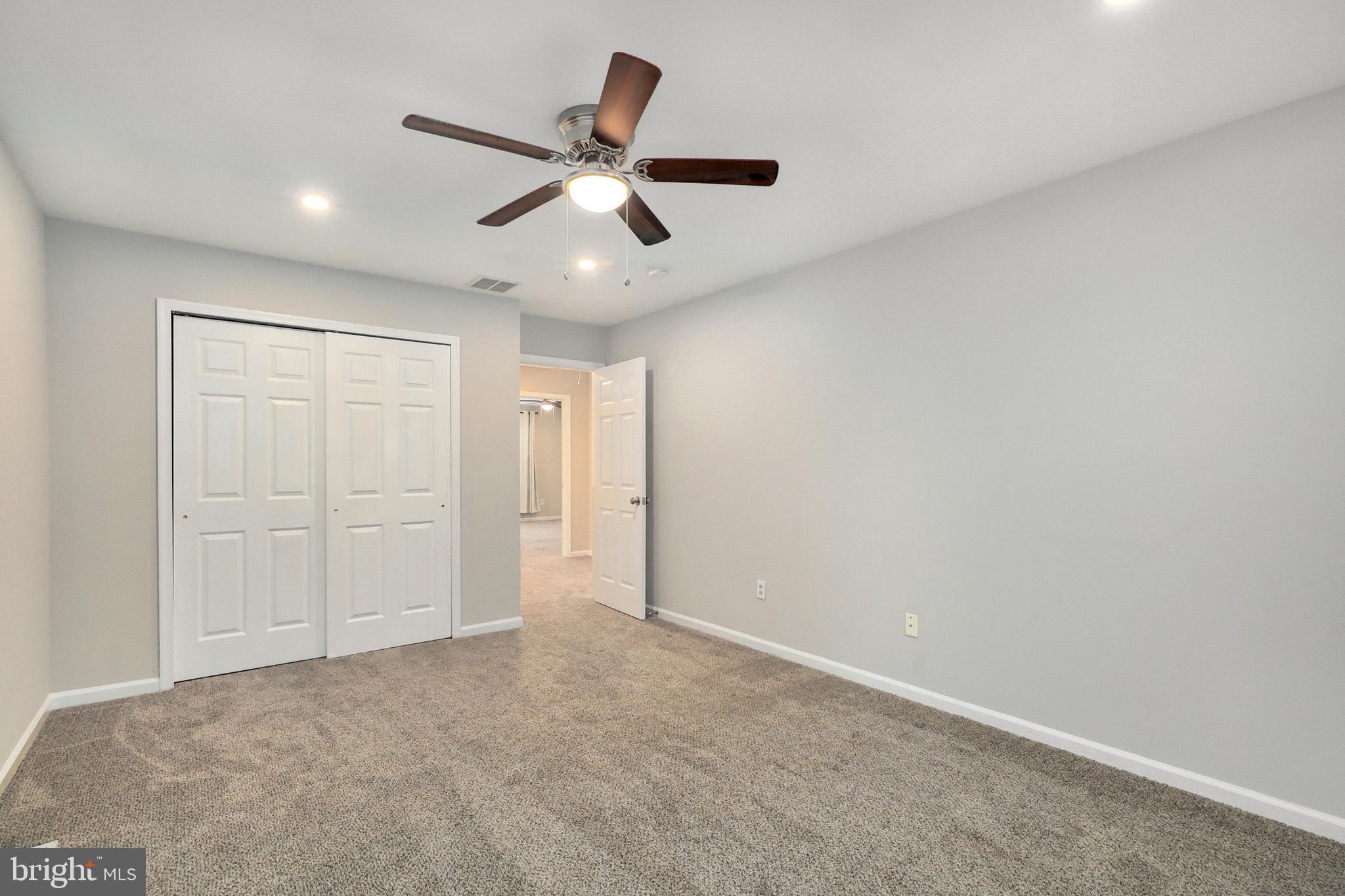 1804 Mason Run Pine Hill, NJ 08021 - Photo 23 of 32 an empty room with closet and windows
