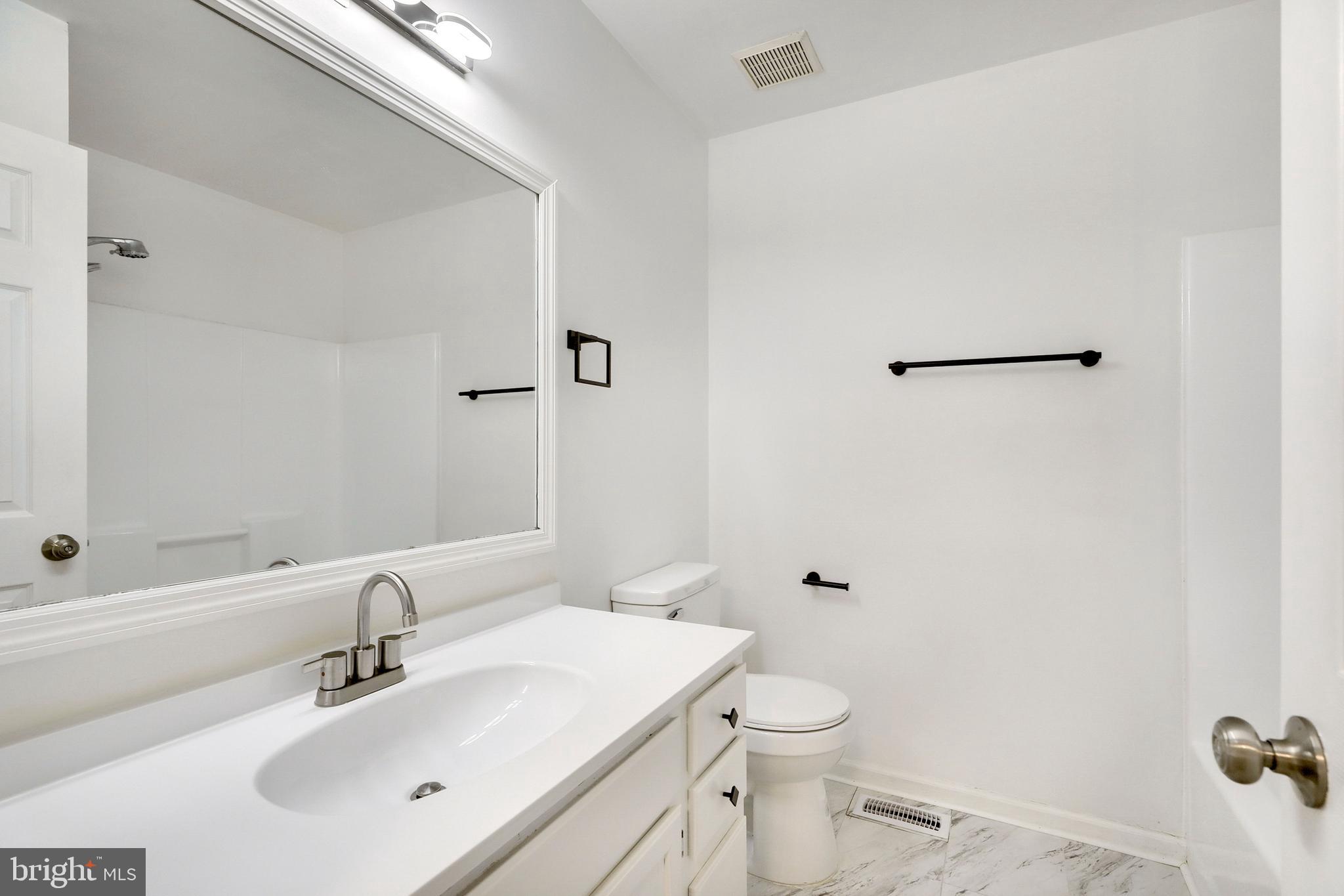 1804 Mason Run Pine Hill, NJ 08021 - Photo 24 of 32 a bathroom with a sink toilet and shower