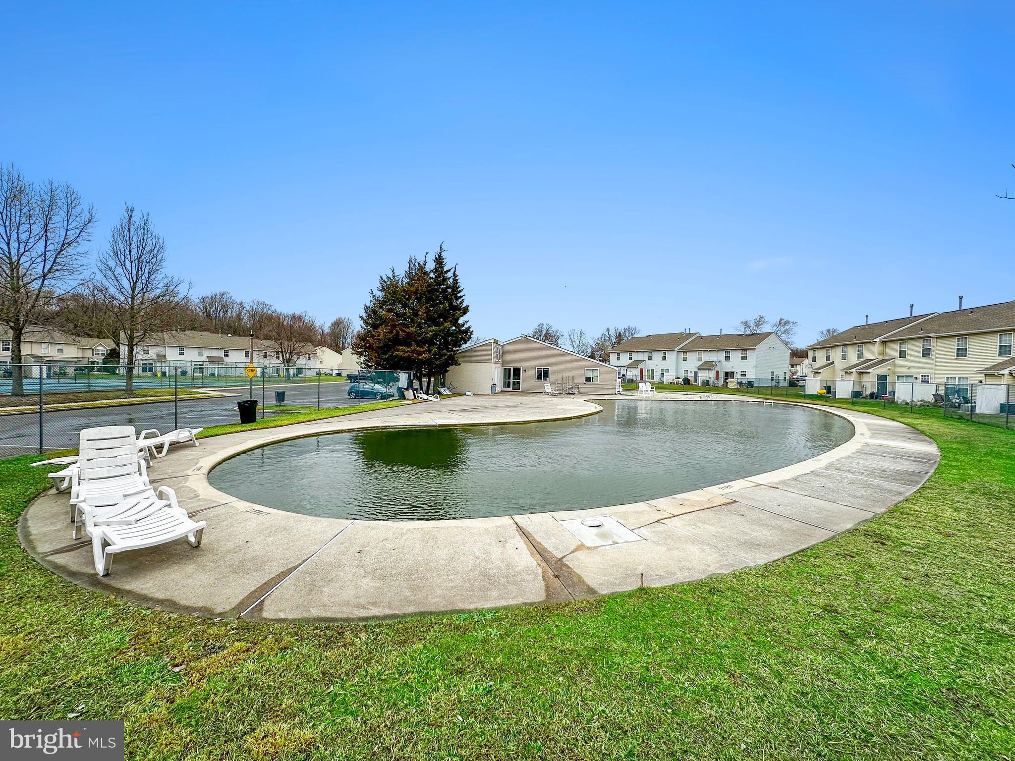 1804 Mason Run Pine Hill, NJ 08021 - Photo 30 of 32 a view of a lake with houses in the back