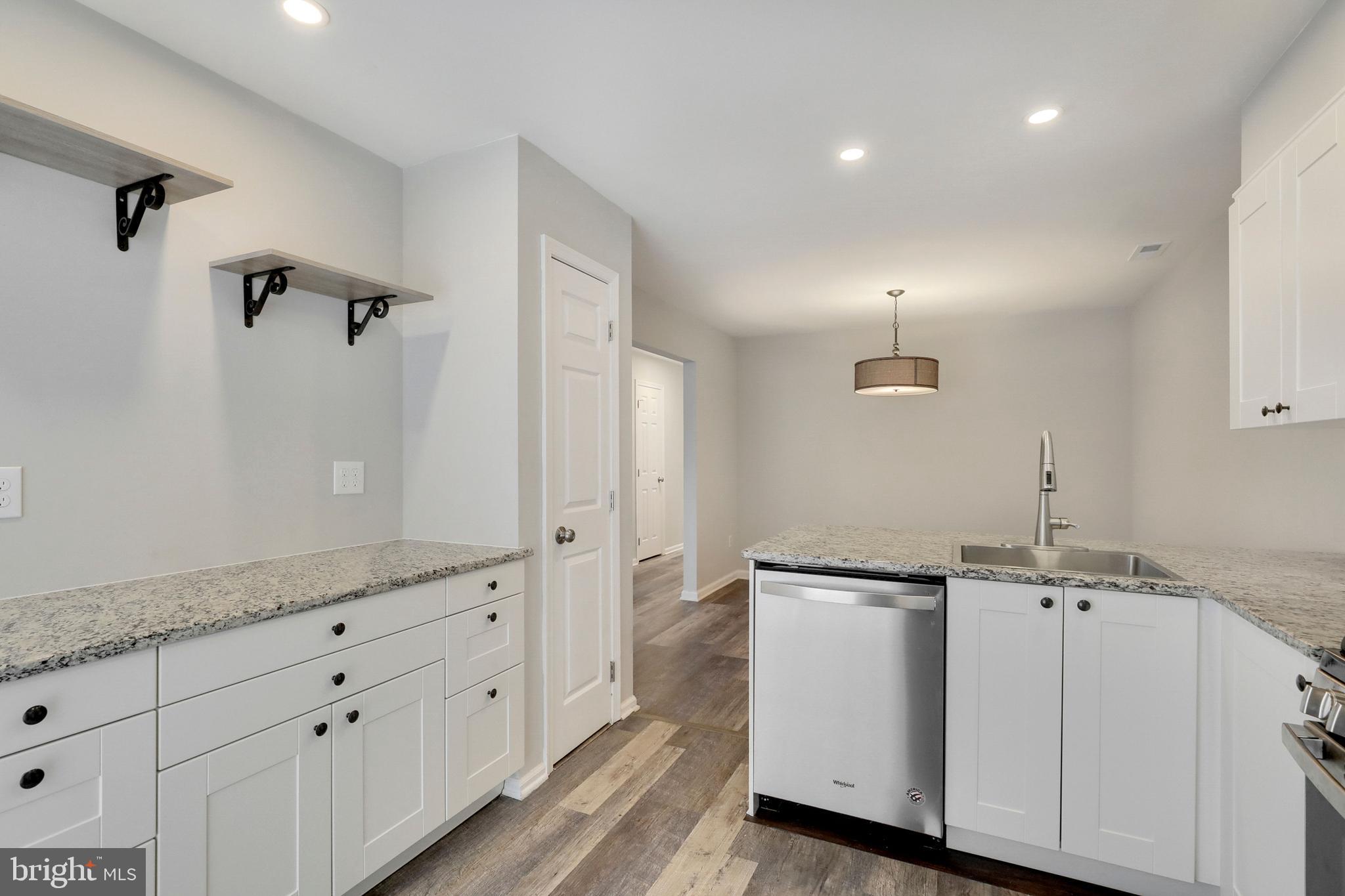 1804 Mason Run Pine Hill, NJ 08021 - Photo 4 of 32 a view of a kitchen with white cabinets