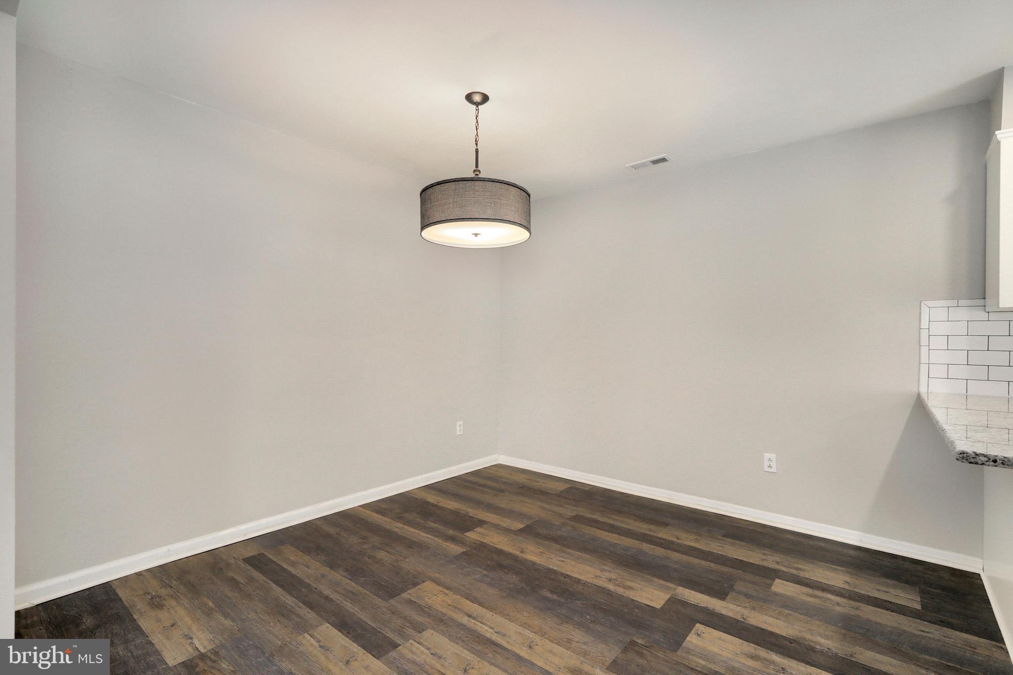 1804 Mason Run Pine Hill, NJ 08021 - Photo 8 of 32 a view of a room with wooden floor and fan