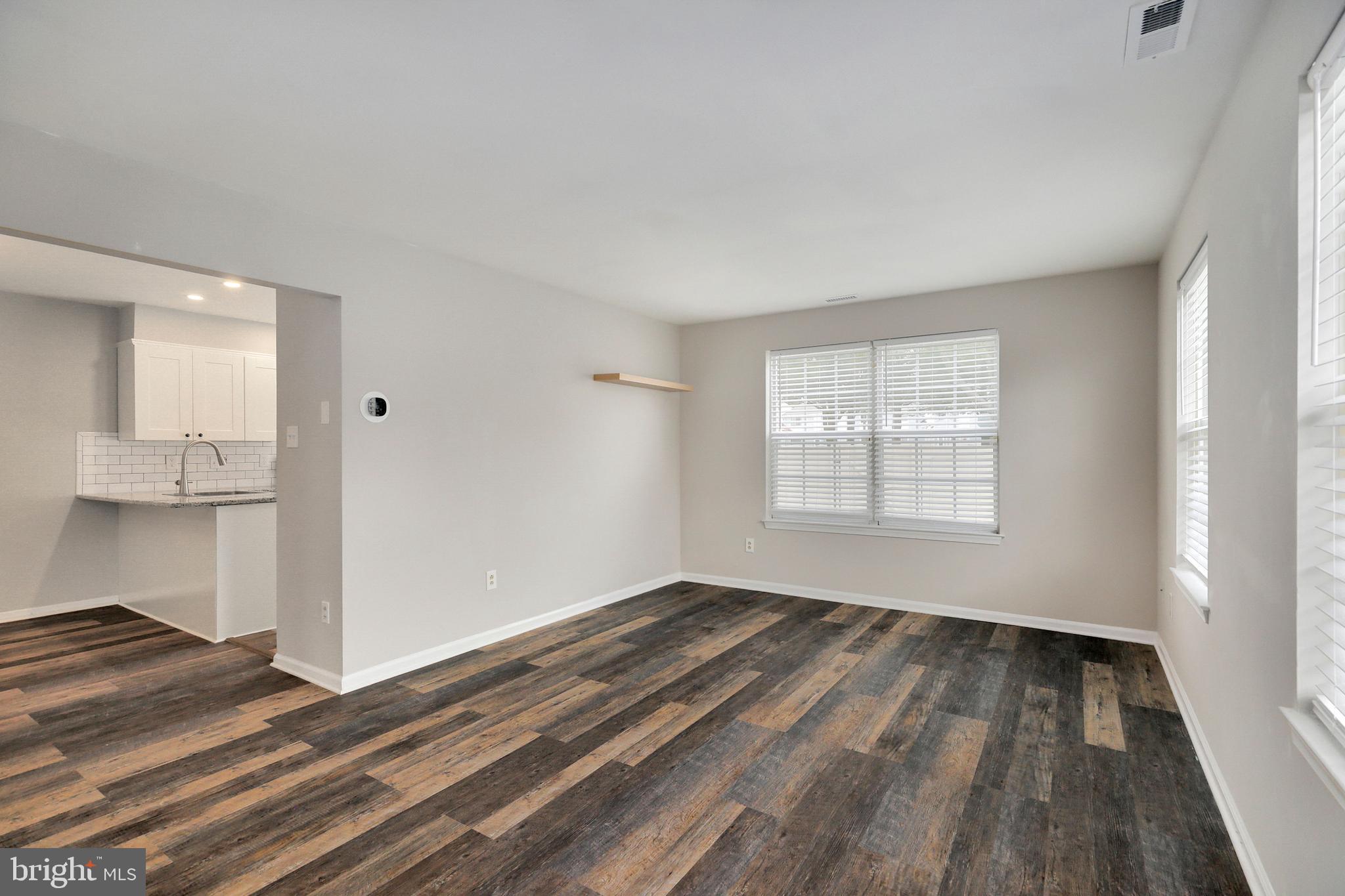 1804 Mason Run Pine Hill, NJ 08021 - Photo 9 of 32 a view of empty room with wooden floor and fan