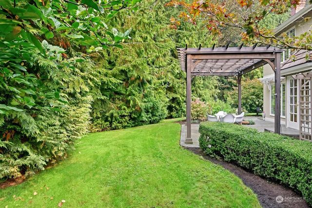 a view of a back yard from a garden