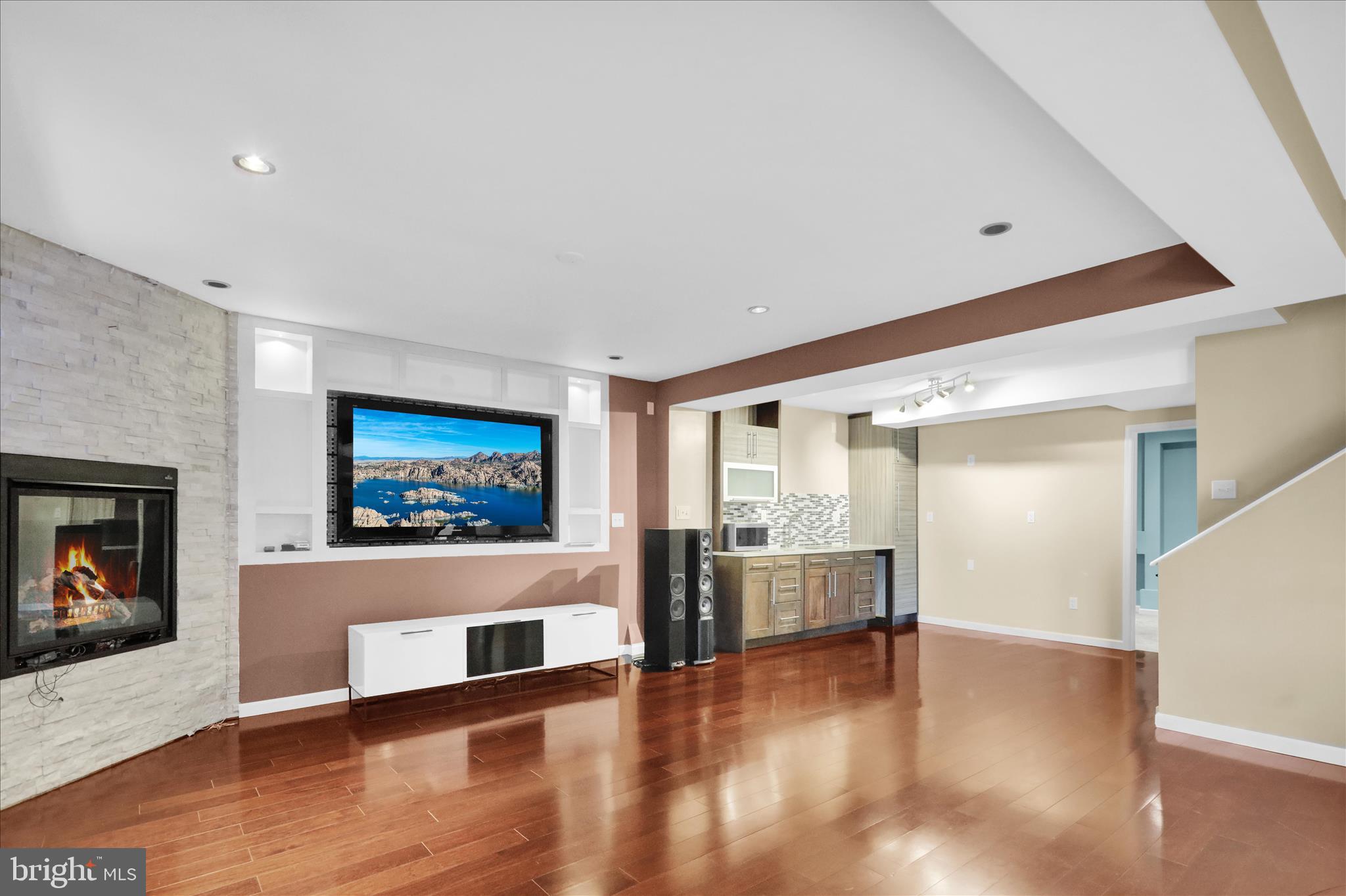 18 Bowes Lane Reading, PA 19606 - Photo 23 of 34 a view of a living room with hardwood floor and a flat screen tv