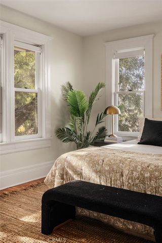 a view of a chair and table in the balcony