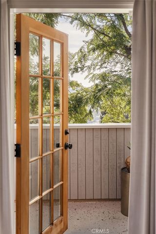 a bathroom with a sink a mirror and a toilet