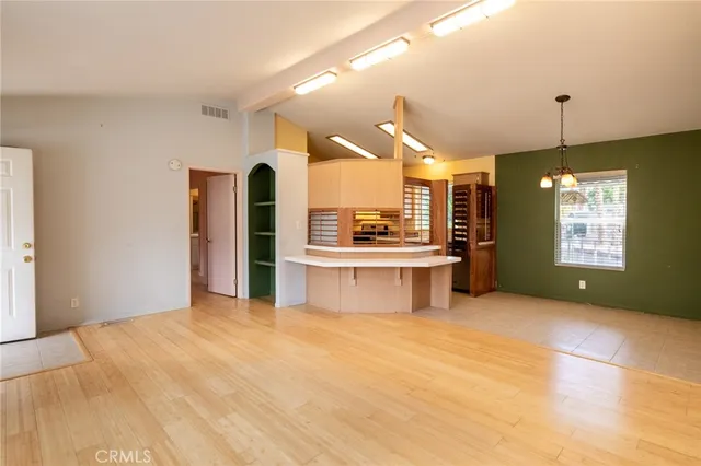 a view of a bathroom with a tub and a shower