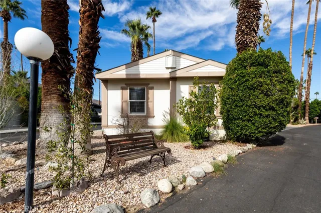a view of balcony with furniture