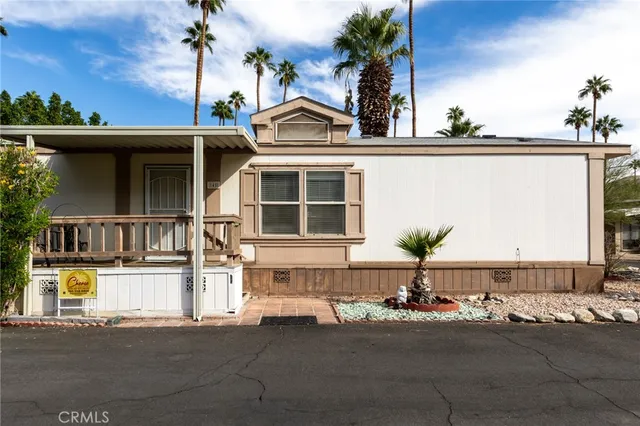 front view of a house with a street