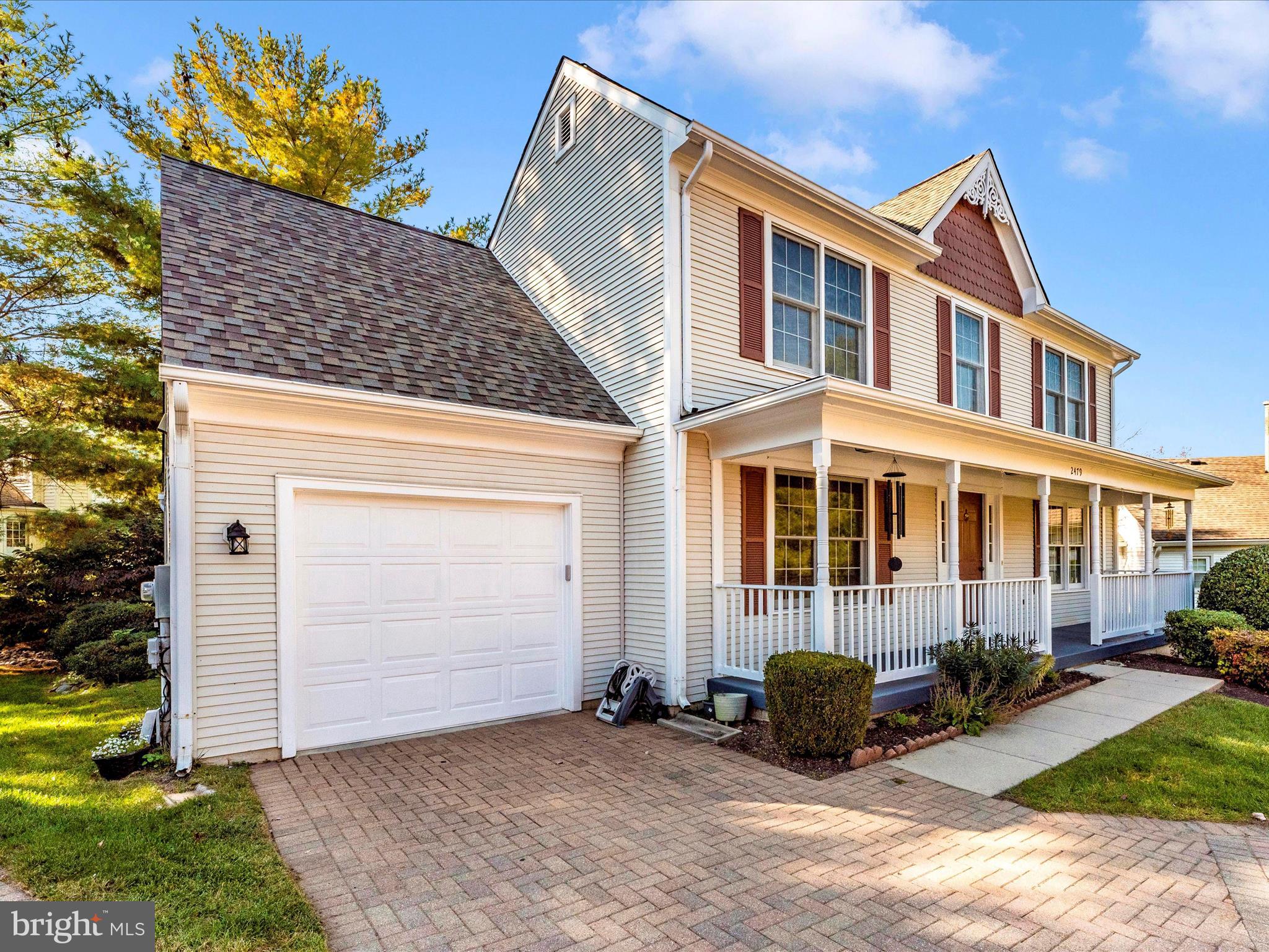 2479 Five Shillings Road Frederick, MD 21701 - Photo 1 of 52 a front view of a house with a yard