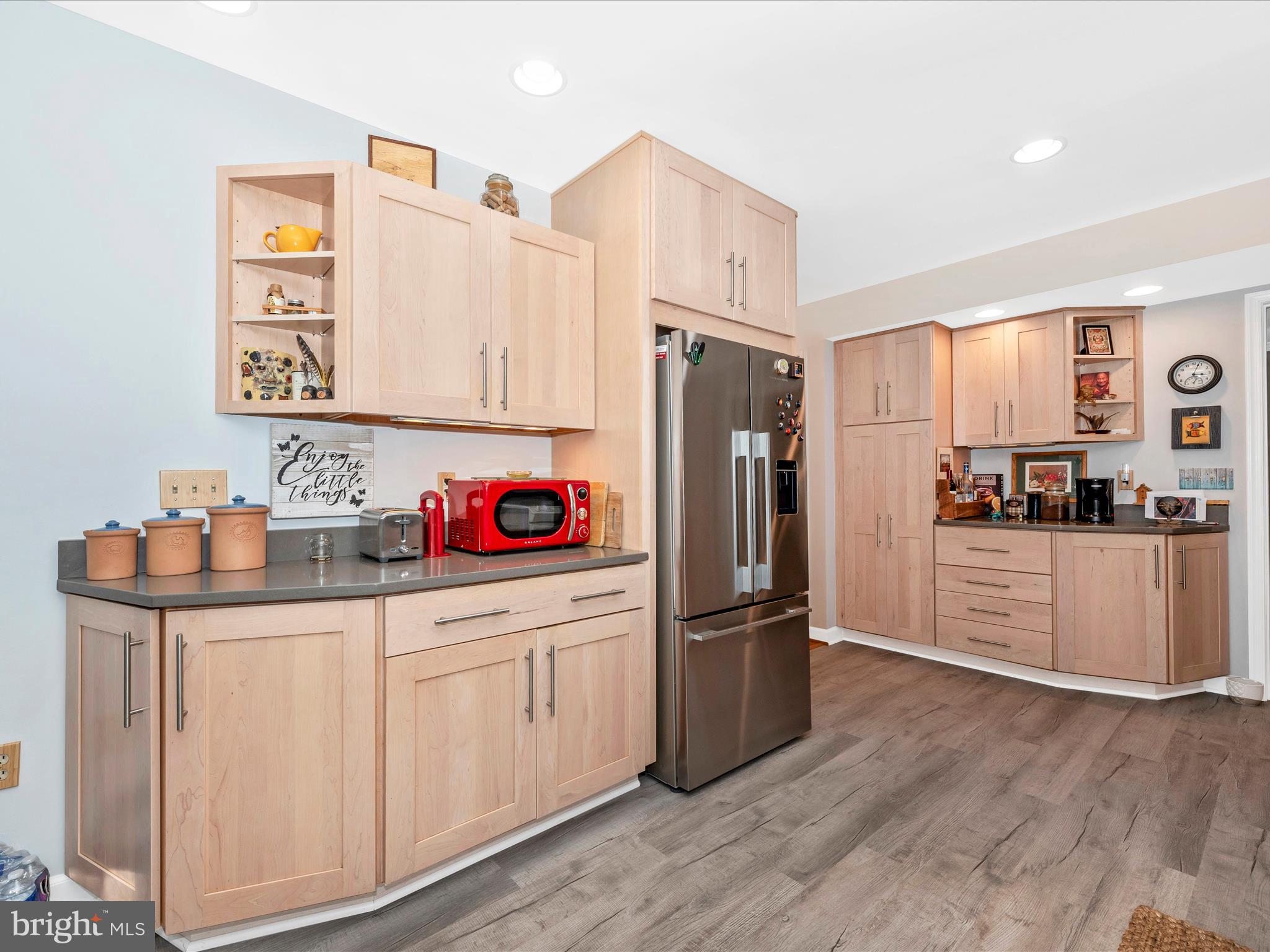 2479 Five Shillings Road Frederick, MD 21701 - Photo 11 of 52 a kitchen with stainless steel appliances a refrigerator and cabinets