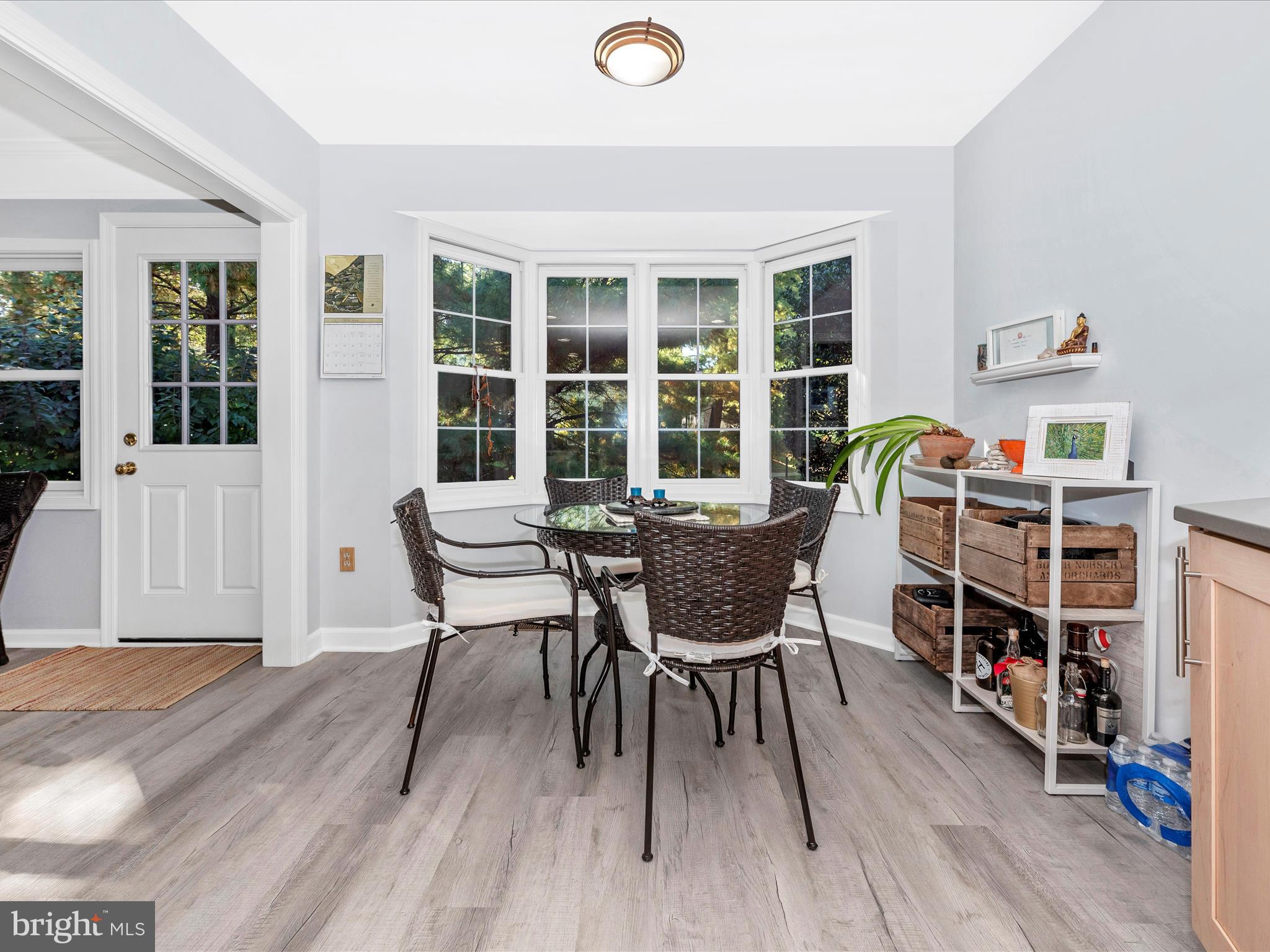 2479 Five Shillings Road Frederick, MD 21701 - Photo 14 of 52 a dining room with furniture and wooden floor