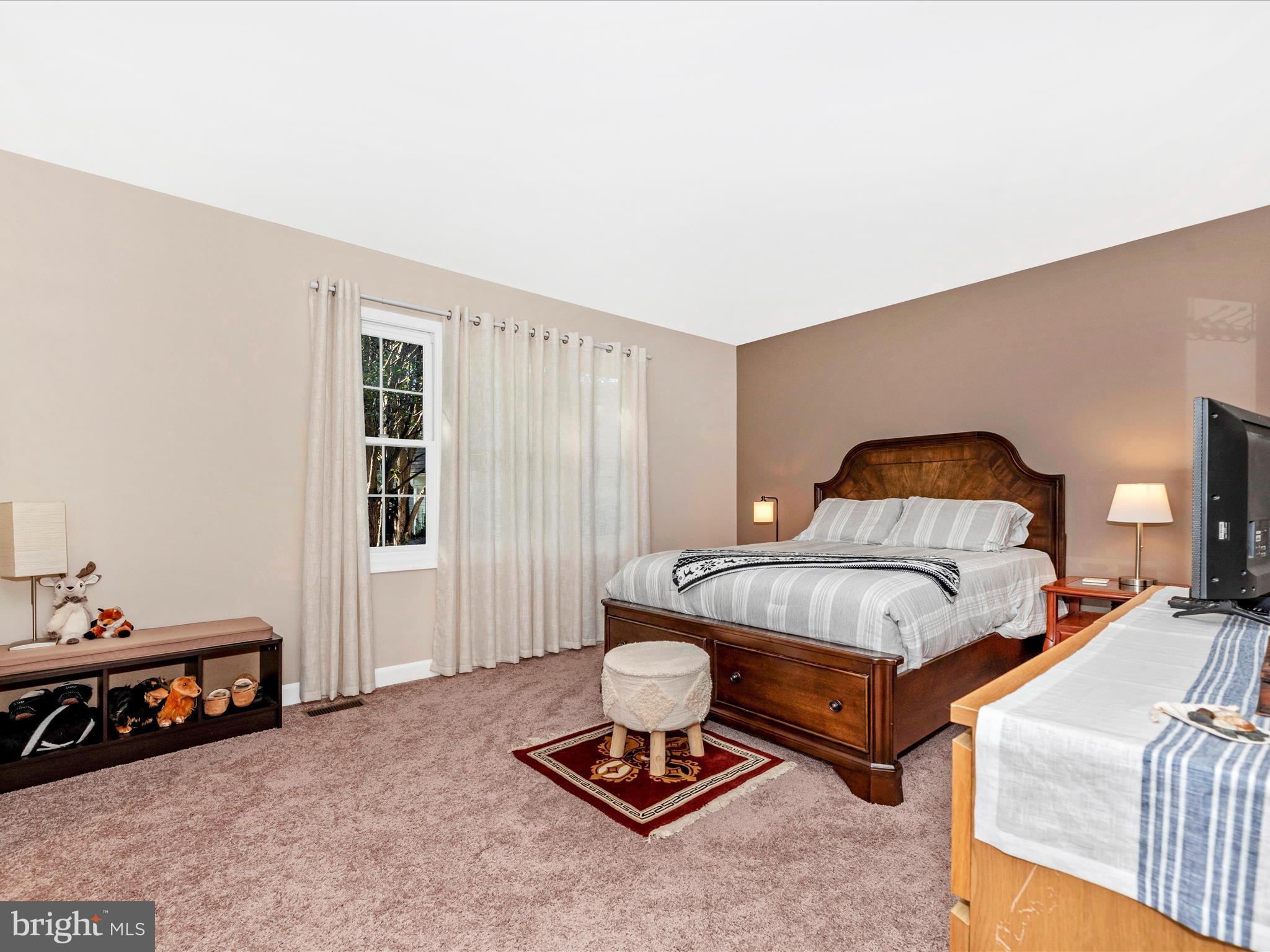 2479 Five Shillings Road Frederick, MD 21701 - Photo 18 of 52 a bedroom with a bed and a window