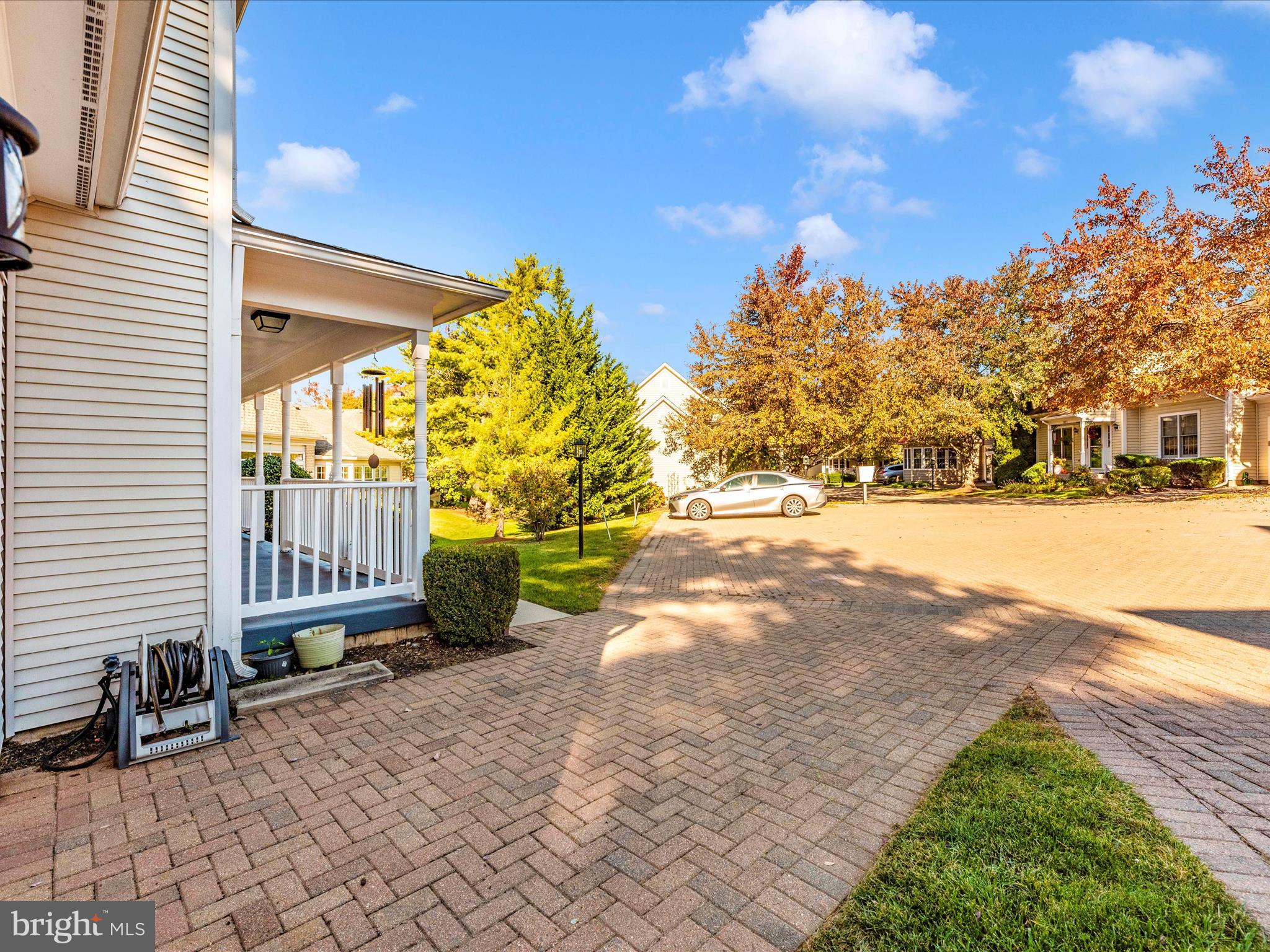 2479 Five Shillings Road Frederick, MD 21701 - Photo 4 of 52 a view of a porch with furniture and a yard