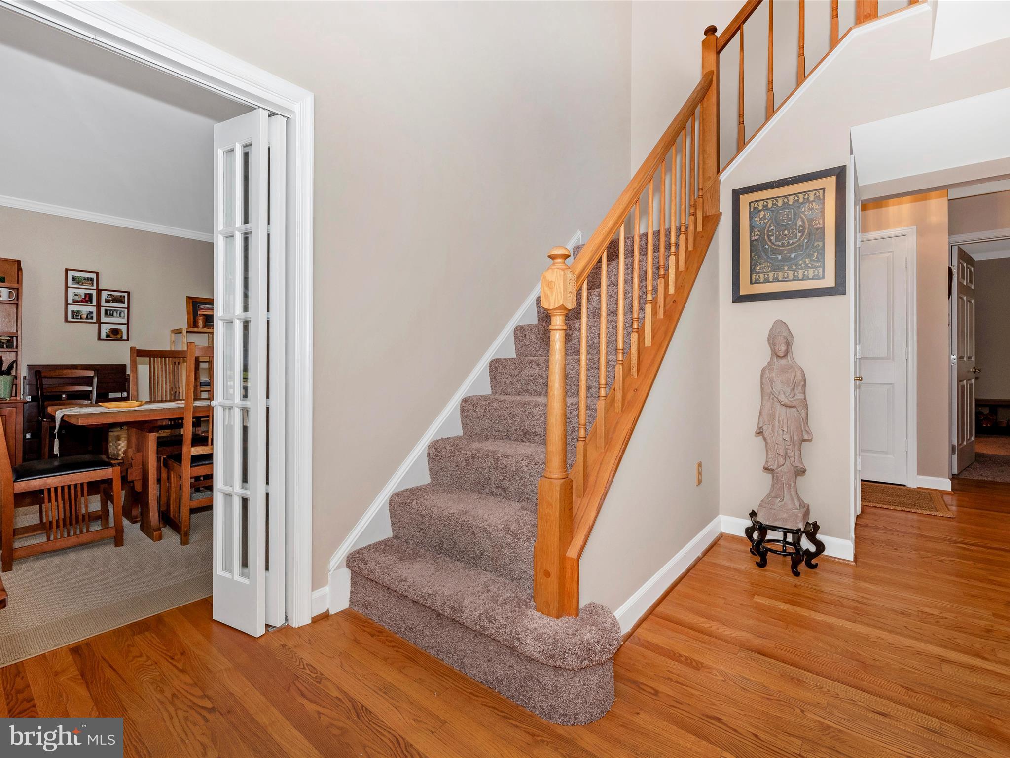 2479 Five Shillings Road Frederick, MD 21701 - Photo 7 of 52 a view of entryway and hall with wooden floor