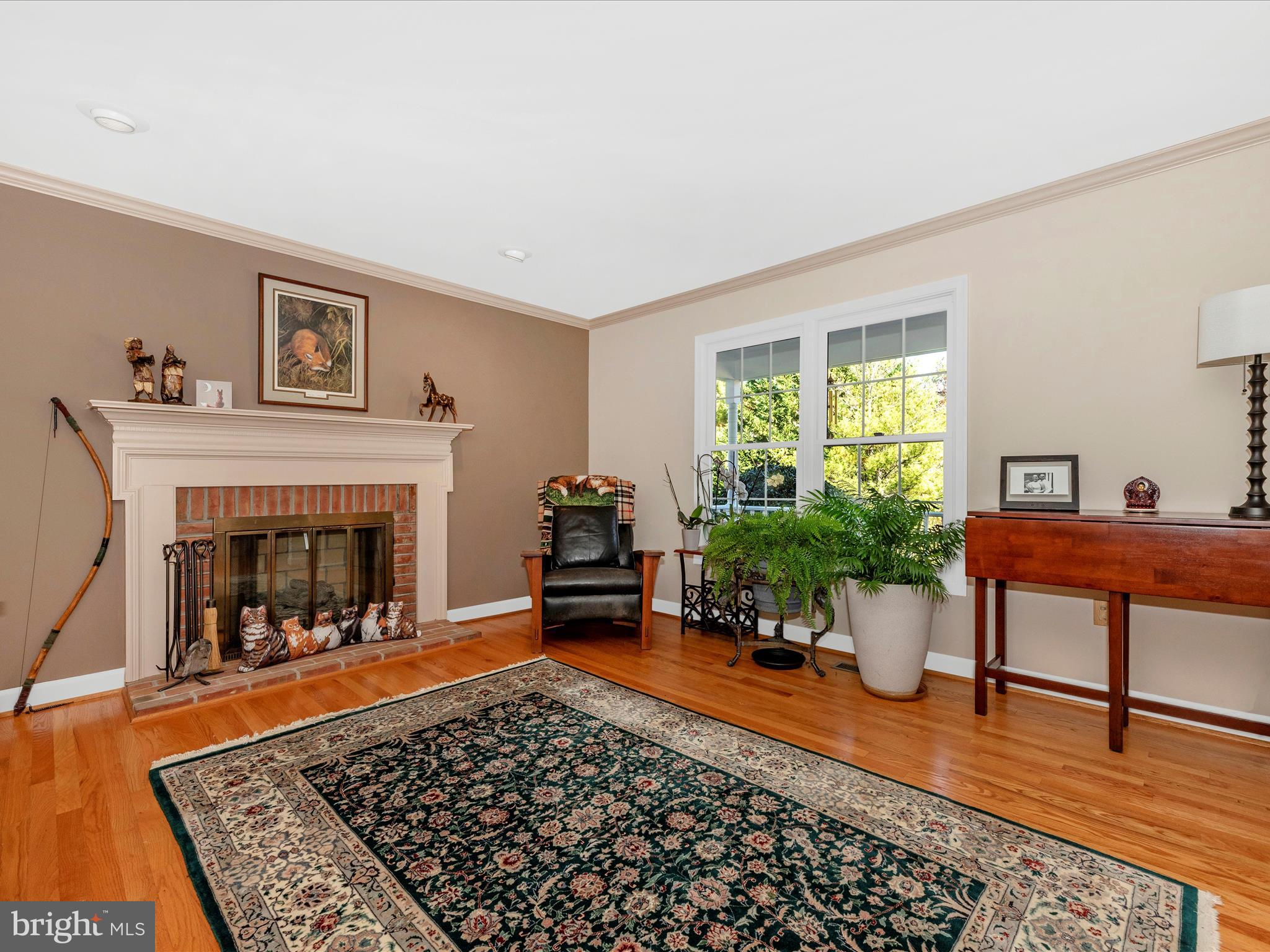 2479 Five Shillings Road Frederick, MD 21701 - Photo 8 of 52 a living room with furniture and a fireplace
