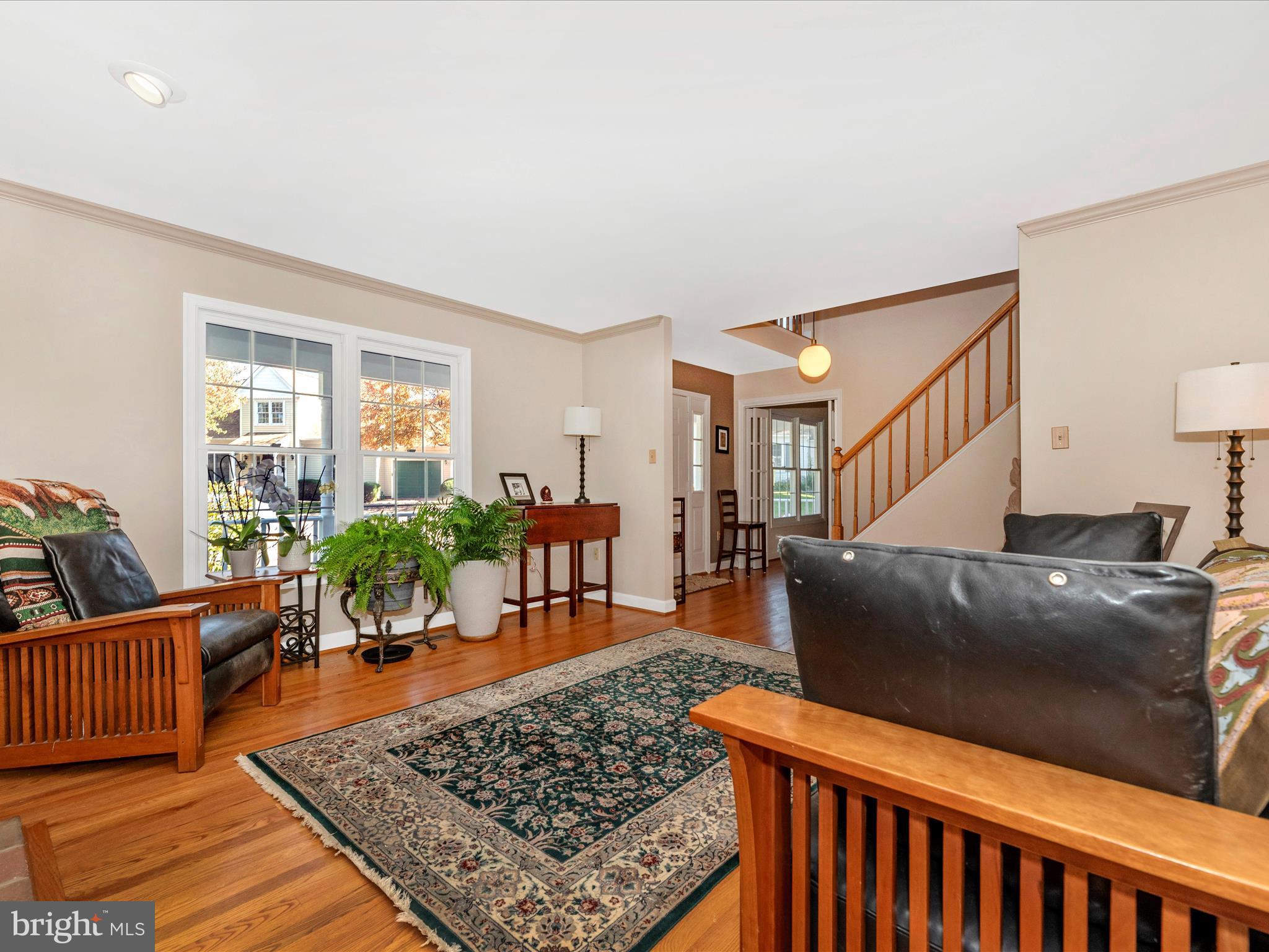2479 Five Shillings Road Frederick, MD 21701 - Photo 9 of 52 a living room with furniture and a rug