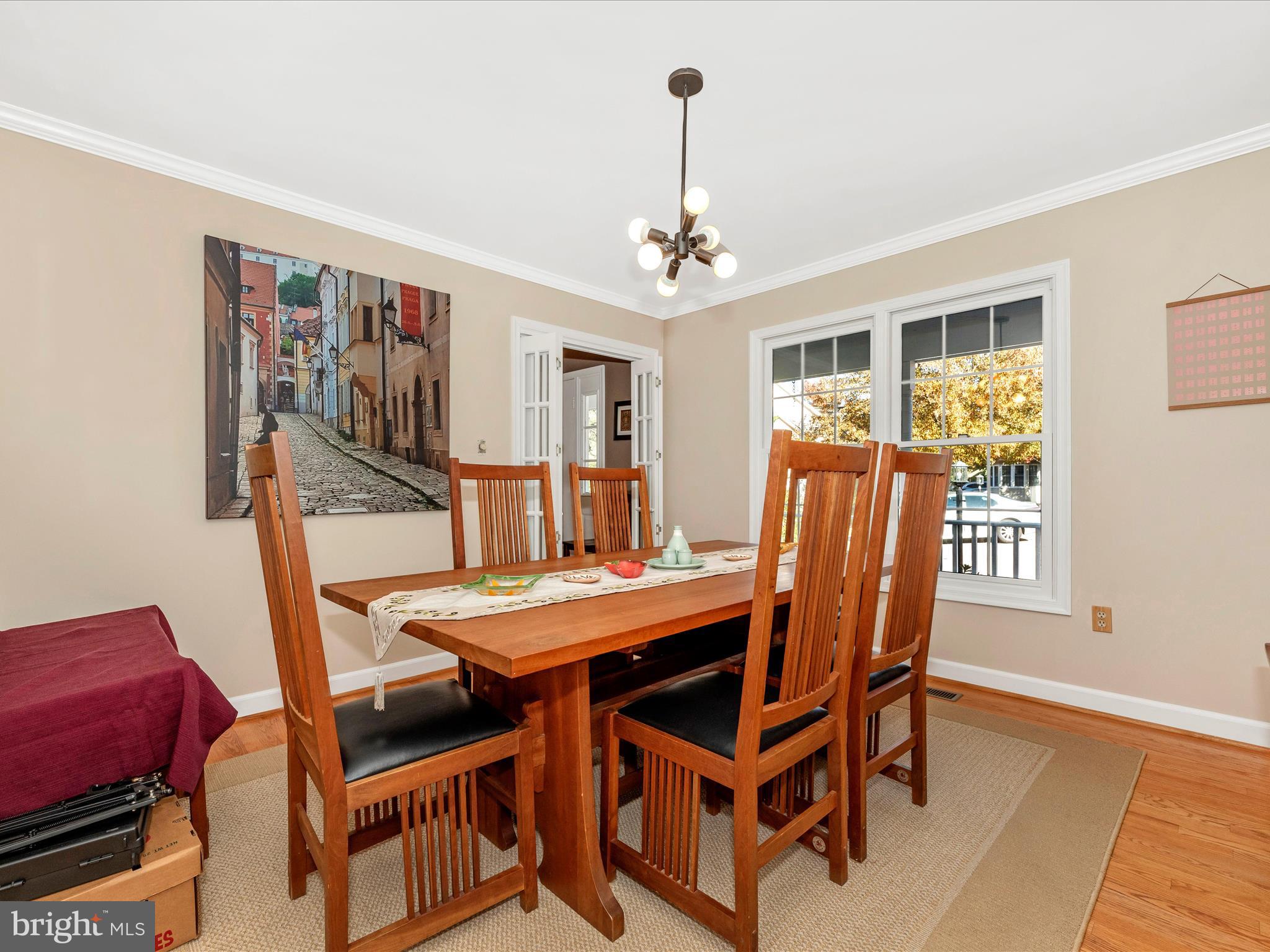 2479 Five Shillings Road Frederick, MD 21701 - Photo 10 of 52 a view of a dining room with furniture window and wooden floor