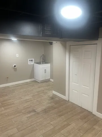 a view of a room with cabinets