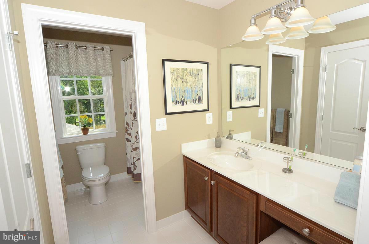 757 Waugh Chapel Road Odenton, MD 21113 - Photo 26 of 30 2nd Floor Hall Bath / Photo of Previous Model Home