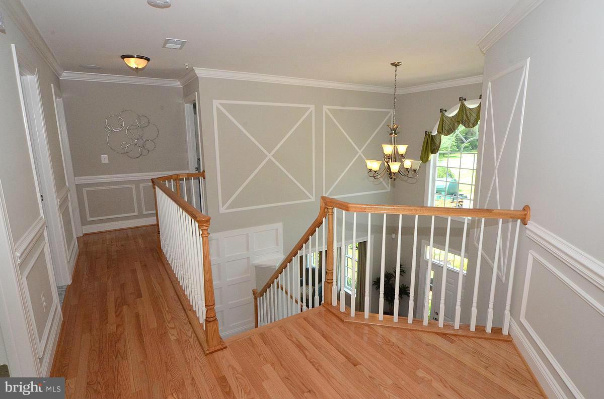757 Waugh Chapel Road Odenton, MD 21113 - Photo 5 of 30 Second Floor Hall / Photo of Previous Model Home