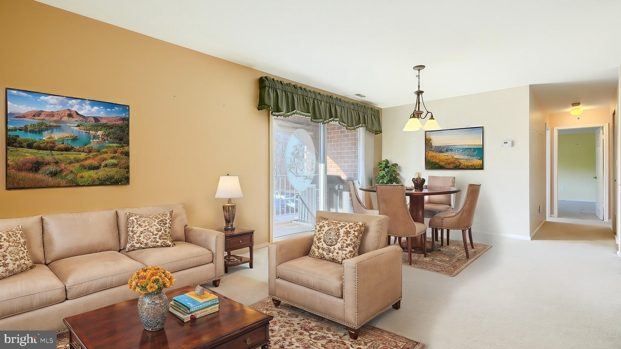 4102 Chardel Road, Unit 2H Nottingham, MD 21236 - Photo 1 of 21 a living room with furniture and a large window