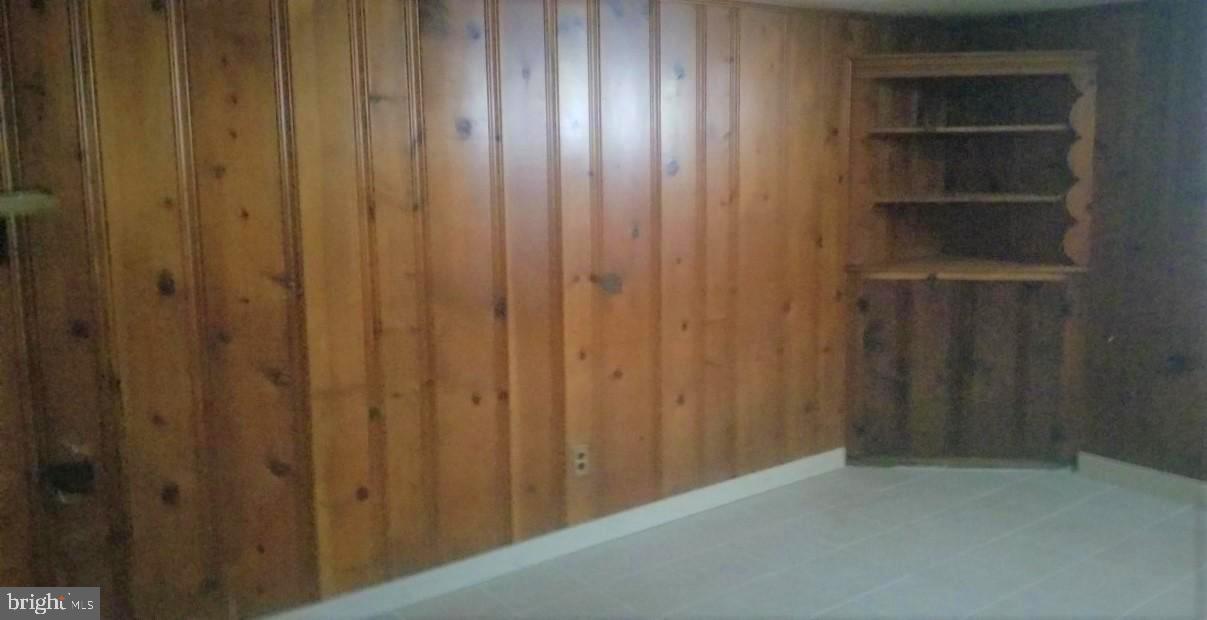 3818 Rexmere Road Baltimore, MD 21218 - Photo 20 of 25 a view of a wooden closet