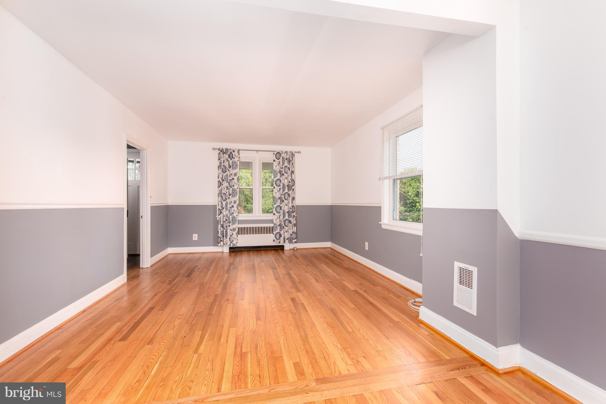 3818 Rexmere Road Baltimore, MD 21218 - Photo 4 of 25 a view of an empty room and window