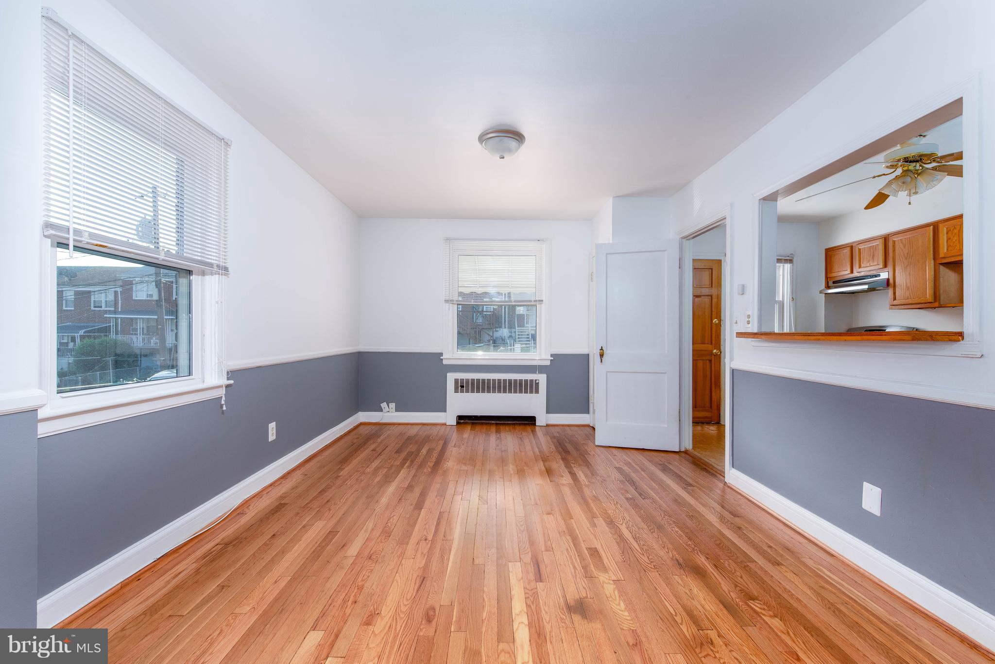 3818 Rexmere Road Baltimore, MD 21218 - Photo 25 of 25 a view of a room with window and wooden floor