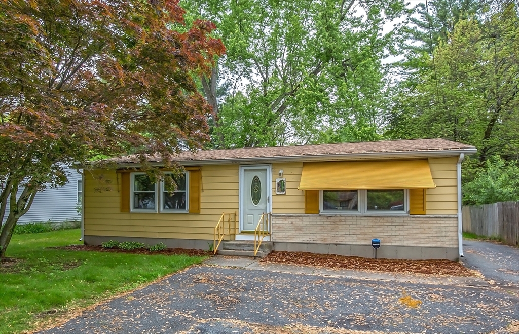 1101 Allen Street Springfield, MA 01118 - Photo 29 of 29 a front view of a house with a garden