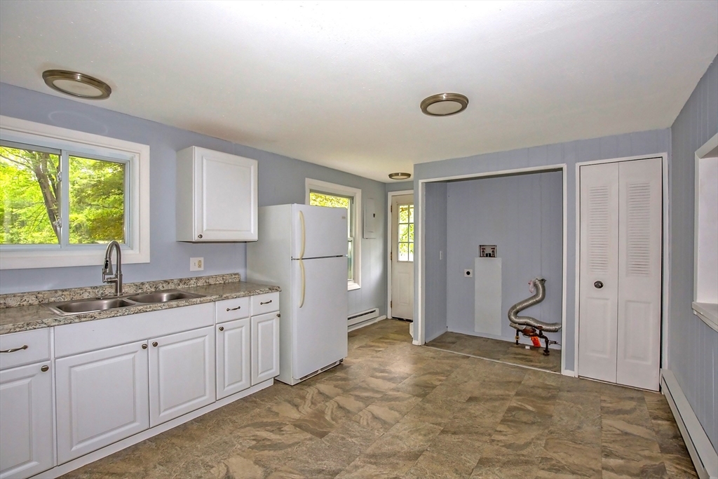 1101 Allen Street Springfield, MA 01118 - Photo 6 of 29 a kitchen with a sink and cabinets