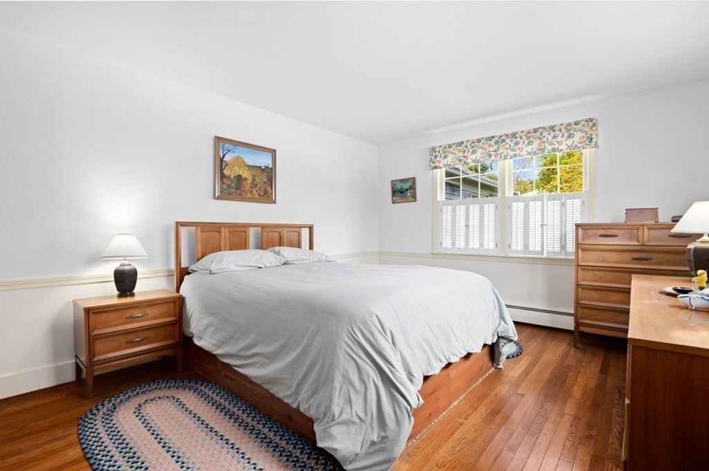 7 Hanover Drive Newbury, MA 01951 - Photo 13 of 33 a bedroom with a bed and a window