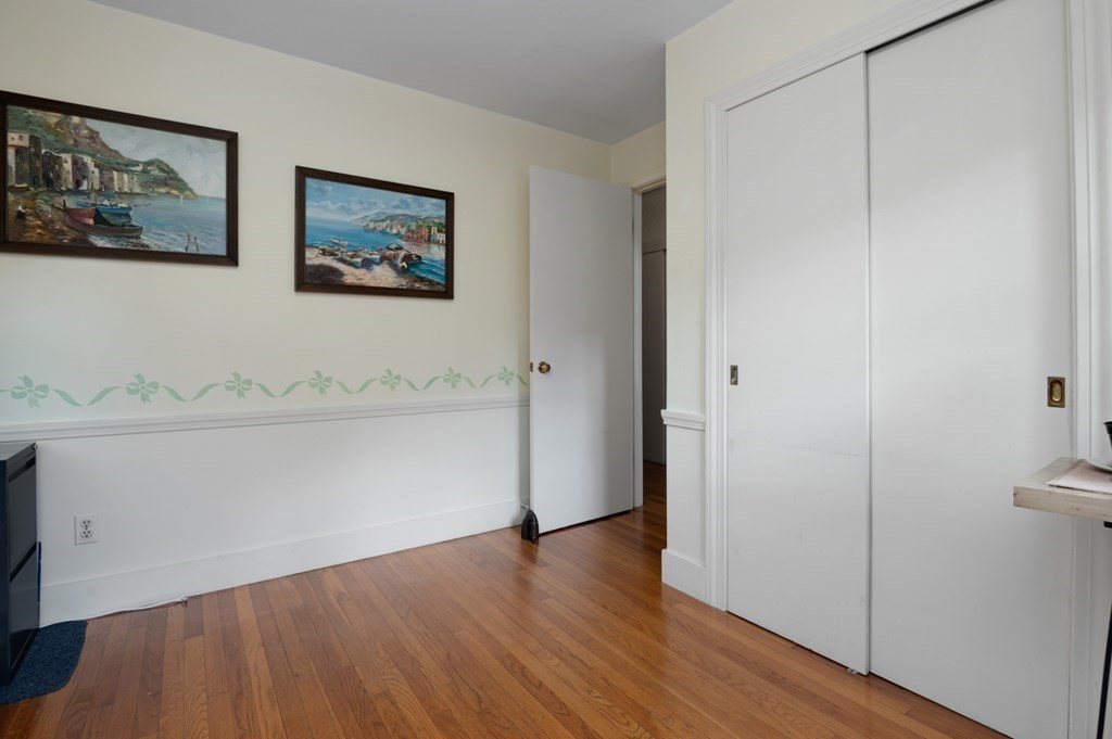 7 Hanover Drive Newbury, MA 01951 - Photo 21 of 33 a view of a hallway with wooden floor