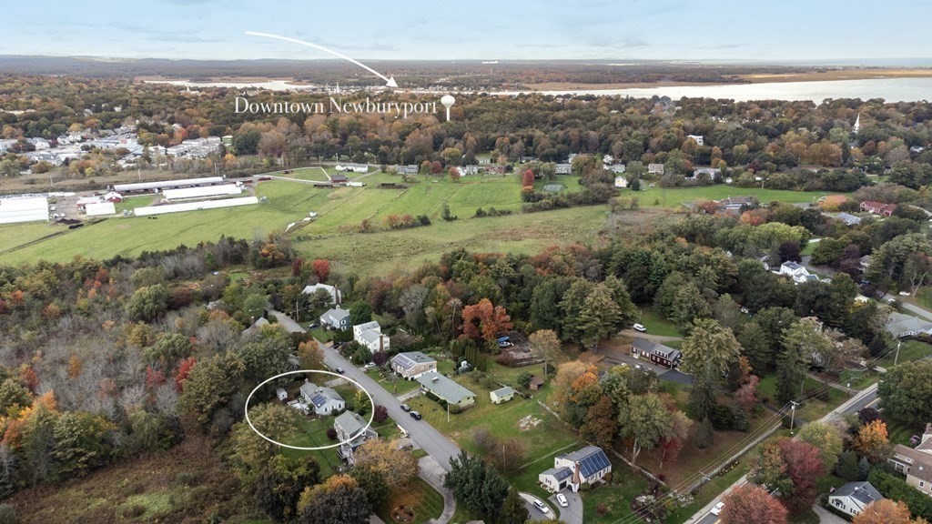 7 Hanover Drive Newbury, MA 01951 - Photo 28 of 33 an aerial view of a city with lots of residential buildings