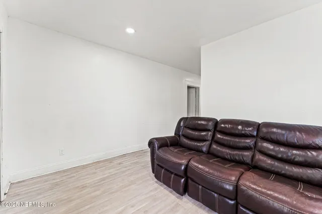 a couch sitting in a living room with a couch