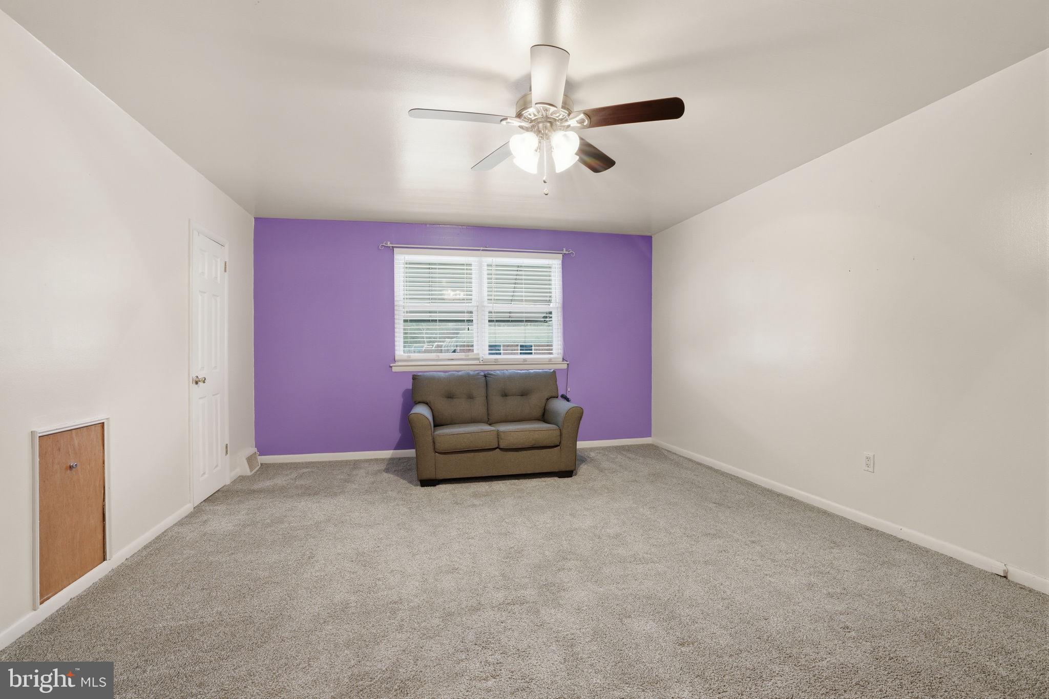2824 Willits Road Philadelphia, PA 19136 - Photo 14 of 22 an empty room with windows and fan