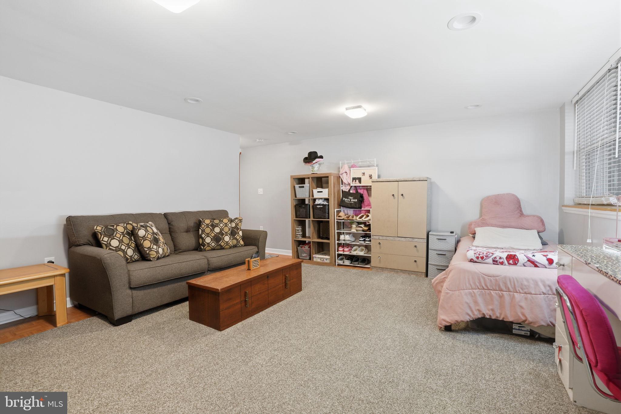 2824 Willits Road Philadelphia, PA 19136 - Photo 20 of 22 a bedroom with furniture and a couch